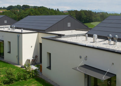 Hamo+ est une construction de 2 groupements de 4 bâtiments contigus constitués chacun de deux appartements à Vers-chez-les-Blanc.